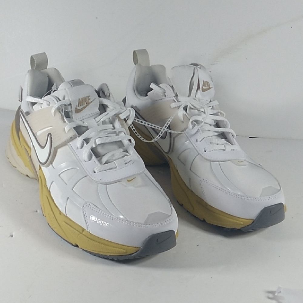 New, Nike White and Gold Athletic Shoes.